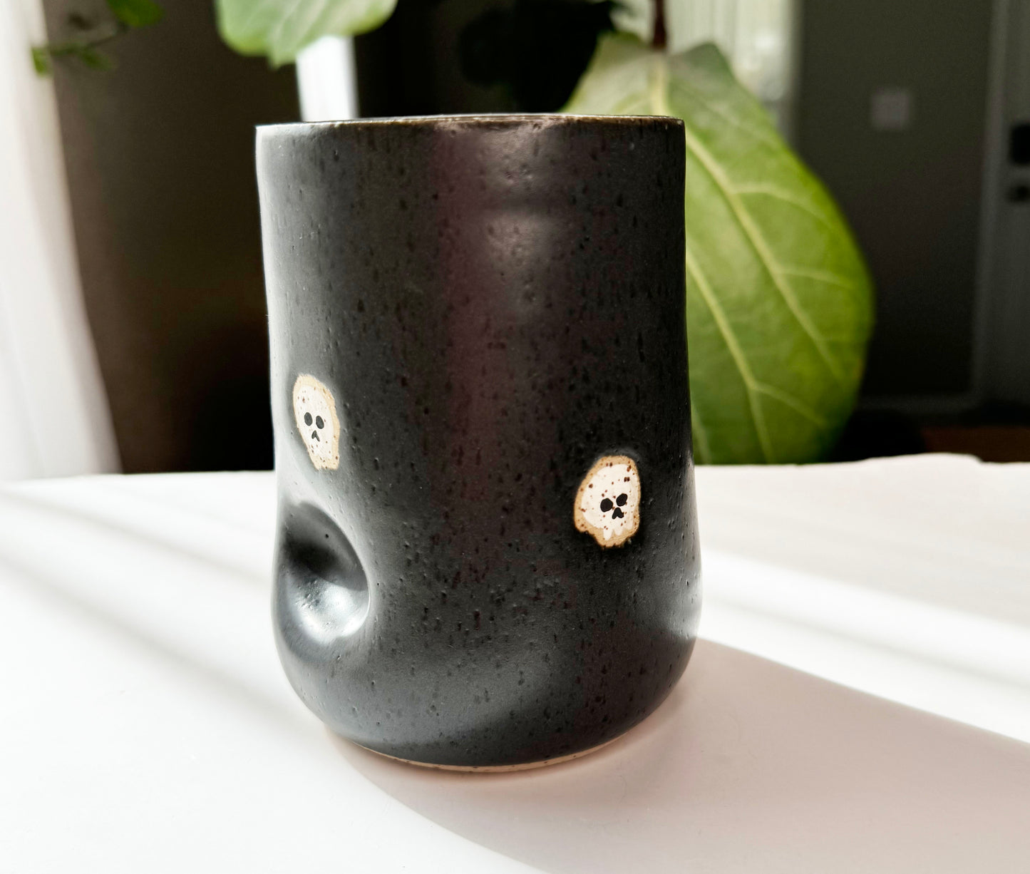 Skull Thumb Cup